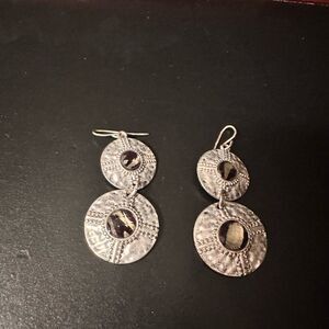 Beautiful round silver earrings with green stone in center of each